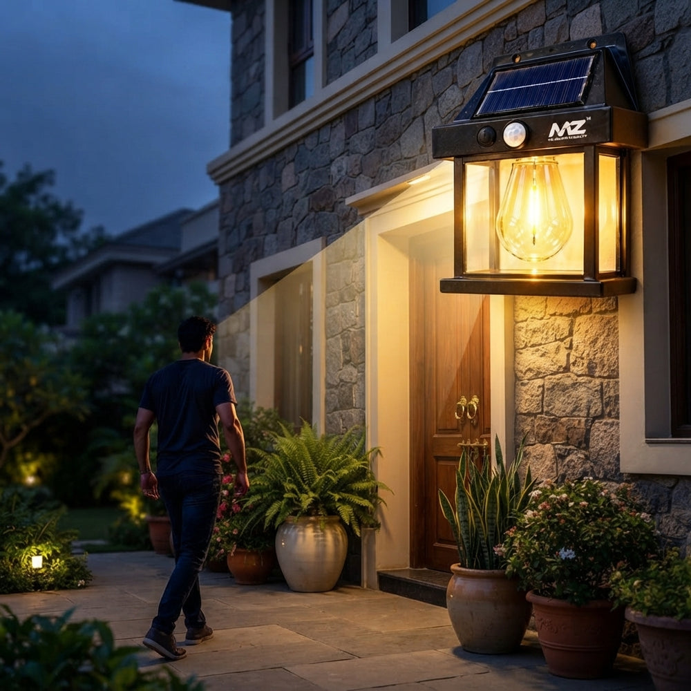 A LumaGlow solar lantern mounted on a stone wall, illuminating an entryway with warm light in a modern Indian home setting.
